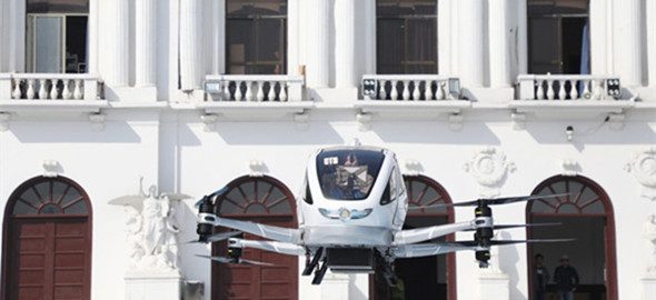 Guangzhou drone maker tests UAV carrying human cargo