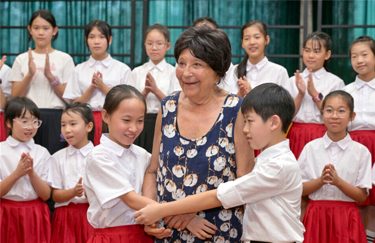 Daughter of Kazakh musician visits Guangzhou and praises its brilliant music