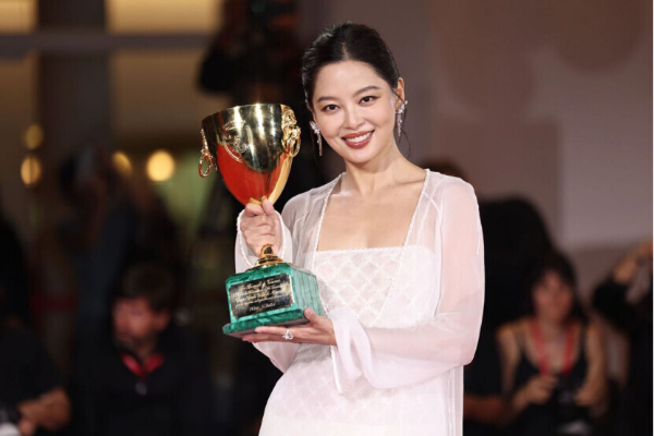 Xin Zhilei wins best actress award at Venice for her role in a Guangdong film
